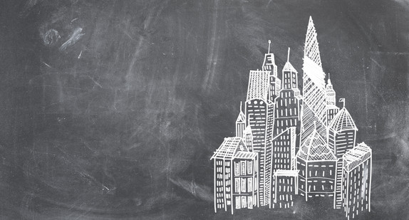 Zeichnung einer Innenstadt mit Hochhäusern auf einer Tafel.