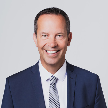 Zu sehen ist ein Portraitbild von Thomas Dörflinger