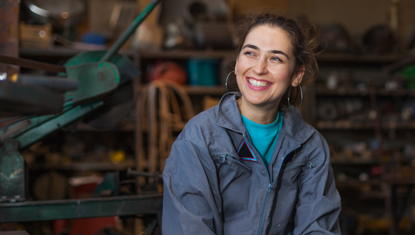 woman, young, mechanic, workshop, sitting, smile, worker, tomboy, happy, overalls, blue, indoors, background, dirt, dirty, face, tools, posing, satisfied, tough, thinking, female, repair, shop, adult, caucasian, industry, service, garage, work, technician, occupation, looking, girl, person, machinery, professional, equipment, apprentice, trainee, profession, workplace, smiling, blurred, brunette, beautiful