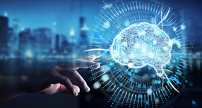 Eine Bildmontage zur Illustration von K&uuml;nstlicher Intelligenz: Hand zeigt auf ein Gehirn