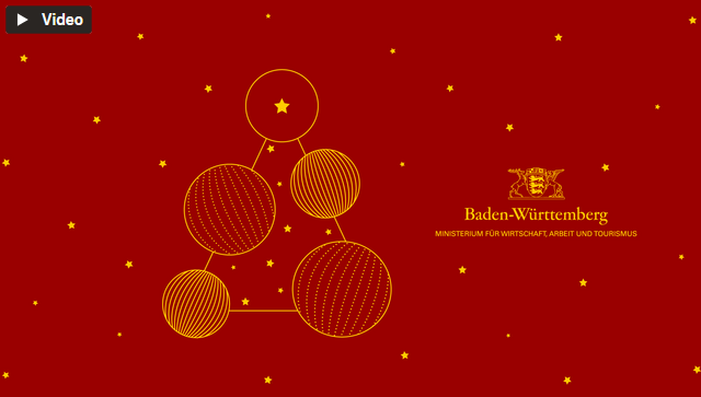 Ein goldener Weihnachtsbaum auf rotem Grund und das Logo des Wirtschaftsministeriums